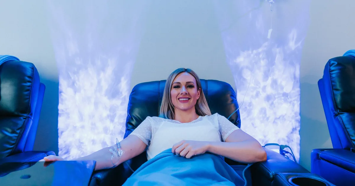 Client receiving IV hydration therapy for energy at iCRYO Daniel Island