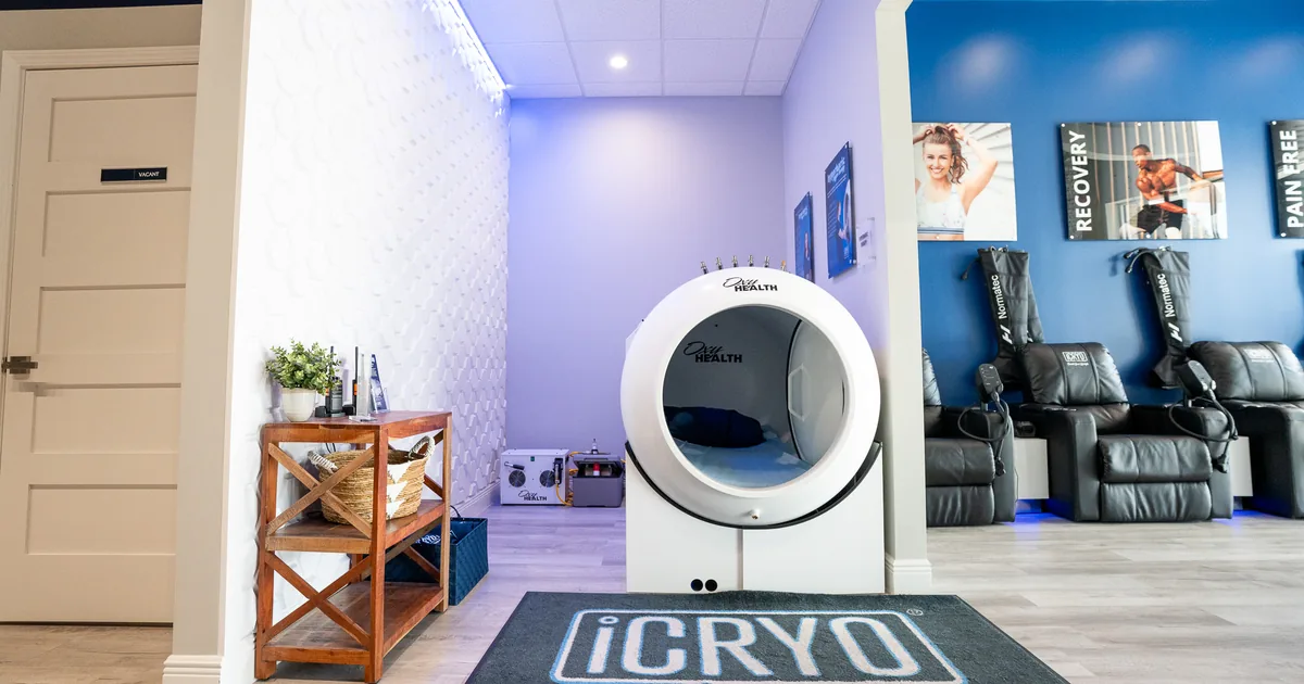 Client relaxing in a hyperbaric oxygen chamber at iCRYO Daniel Island in Charleston, SC