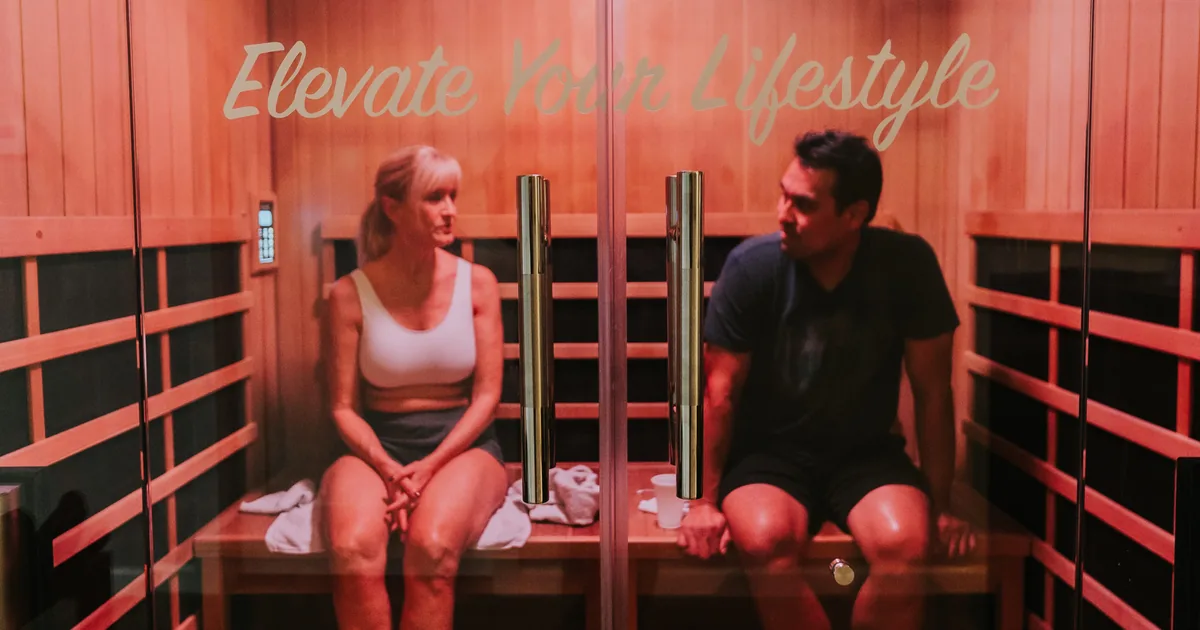 Woman relaxing in an infrared sauna at iCRYO Daniel Island in Charleston, SC